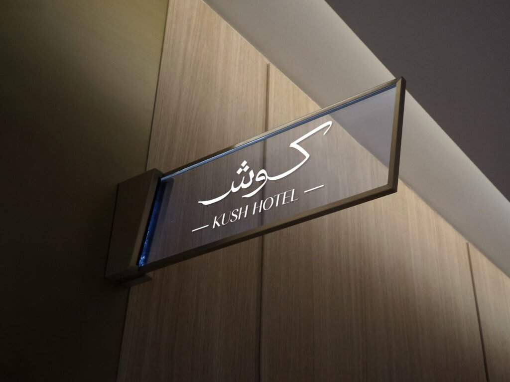 Printo Kush Hotel — Luxury Brand Identity & Visual System Illuminated luxury glass signage for Kush Hotel designed by Printo Agency